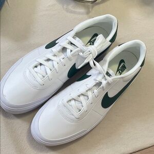 Nike Men’s White Sneakers with Dark Green Swoosh